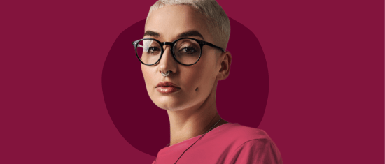 short hair, glasses, pink shirt, facial piercing, bold background